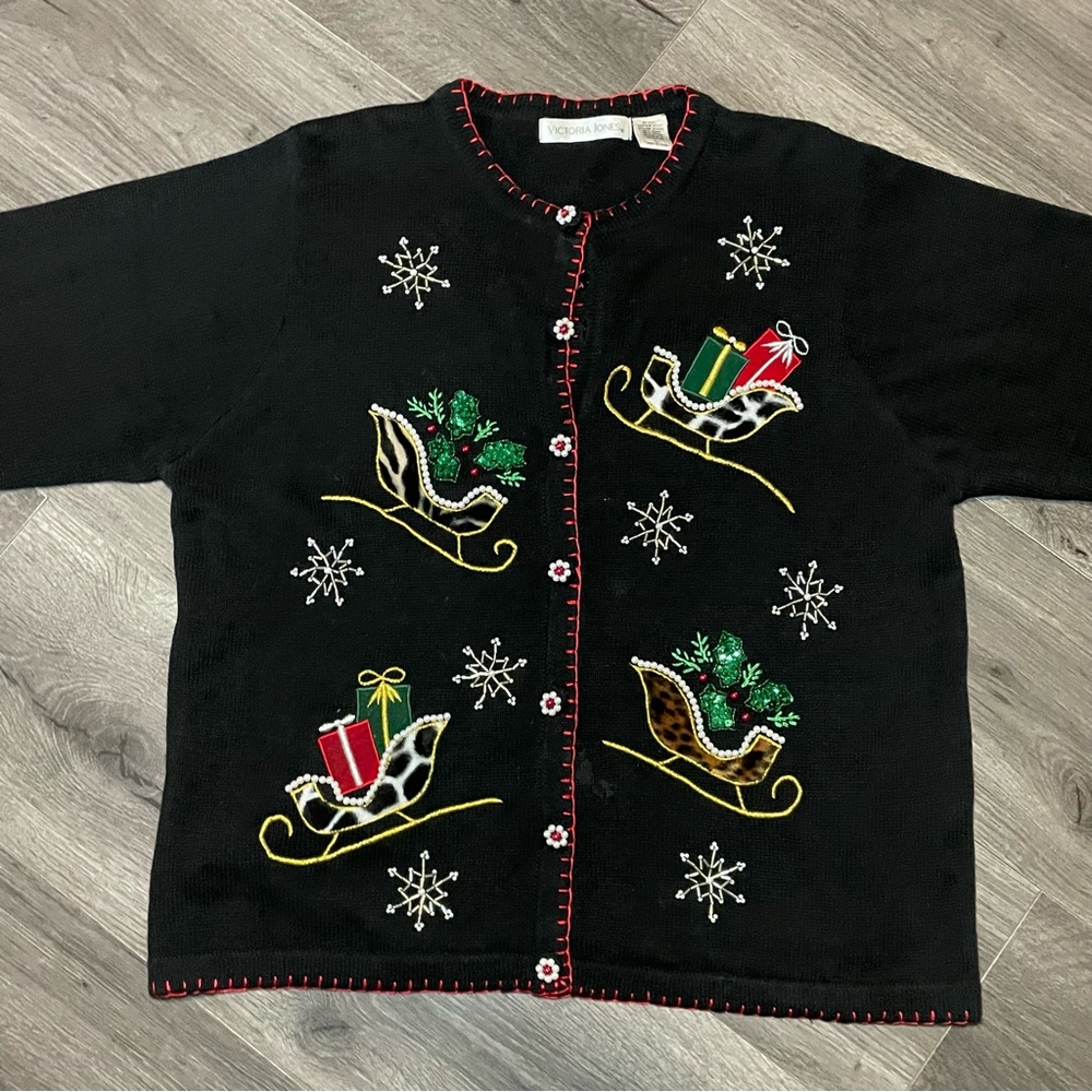 Victoria Jones black embellished animal print sleds size Large